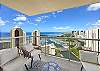 A wide angle highlights the lanai/balcony seating and expansive outlook across Ala Wai Boat Harbor and the Pacific Ocean, a signature feature of this high-floor Watermark Waikiki residence and its furnished outdoor setting.