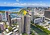 This aerial perspective marks The Watermark near Ala Wai Canal, with Ala Wai Boat Harbor, Magic Island, Ala Moana Beach Park, and the Pacific Ocean placing the condo between Waikiki and Ala Moana in Honolulu.