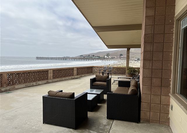 Large oceanfront patio.   Views from Cayucos Pier to Morro Bay.   Gated with private steps to the sand.