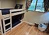 This set of bunks is in the bonus room (the same room as the laundry area, TV/games, sleep sofa and another entrance to the deck.