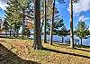 This is a view from the North side of the property near the Catfish Lake lookout deck. There is plenty of space to enjoy the breeze off of the lake and the sunshine sneaking through the coverage of tall pines. 