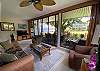 Our living room and lanai with views of the pool, cove & the Island of Molokai.