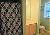 Hall Bath w/Door to Twin Bedroom. 1st level. Stand up shower