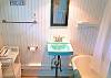 First Floor. Full Bath w/Shower/Tub Combo. Located off Kitchen