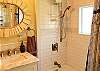 Full Bath with Shower/Tub Combo. 1st Floor. Located off Laundry Room