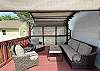 Back deck area with fenced in back yard.  