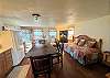 Living area with futon and day bed.