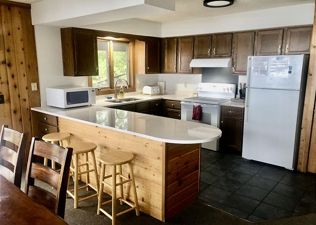 Fully equipped, cooking basics, dishware & flatware, microwave, toaster, drip coffee maker, blender, trash bags, paper towels.