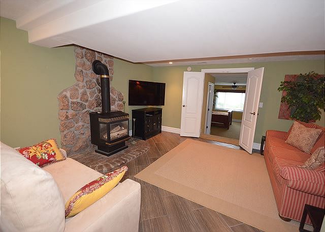 Lower level family room with gas fireplace
