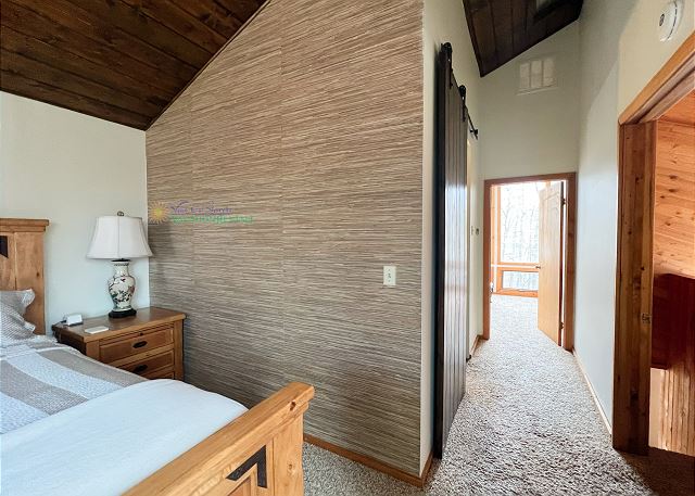 Upstairs bedroom with king bed.