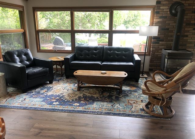 Living area with views of Glen Lake.WiFi, smart TV, CD player, gas fireplace.