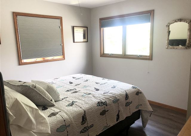 Bedroom with full size bed. 
