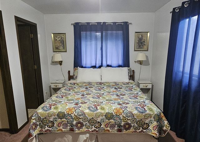 Main floor bedroom with king bed