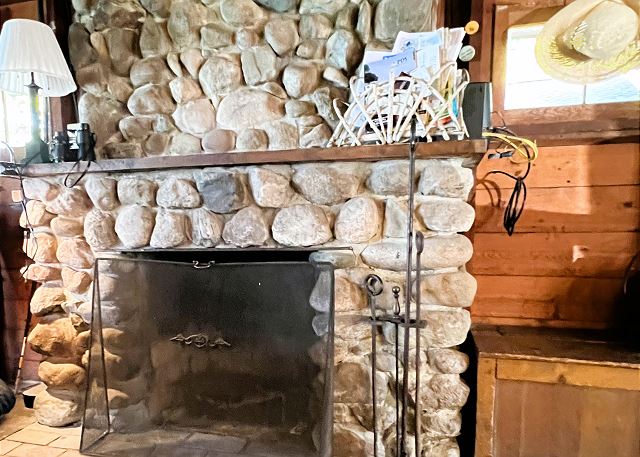 Natural fireplace in living area.