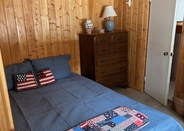 Main floor with queen bed and ensuite bathroom