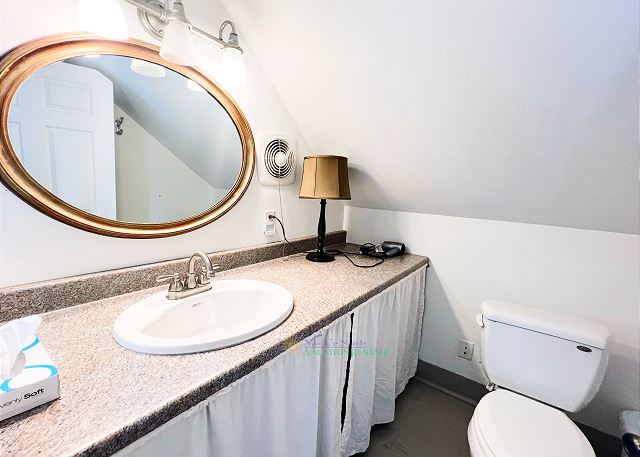 Upstairs bathroom with shower.