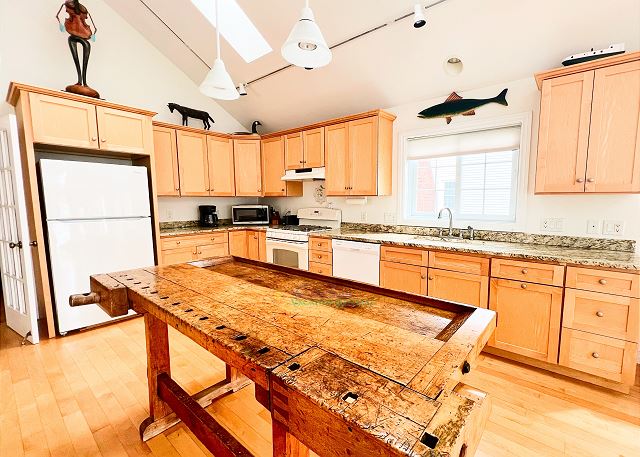 Kitchen with unique island. 