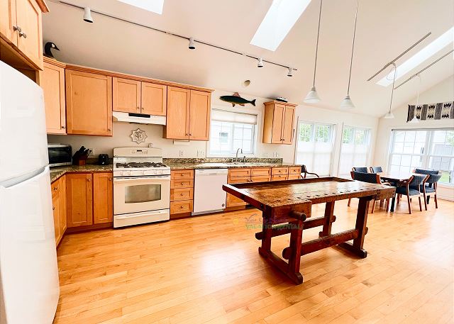 Kitchen with open living and dining area. 