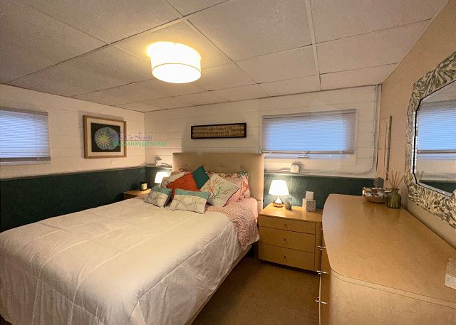 Bedroom with queen bed.