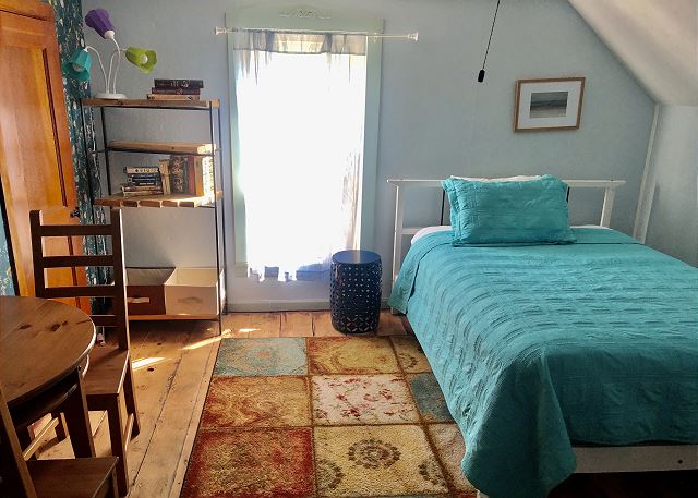Upstairs bedroom with full bed