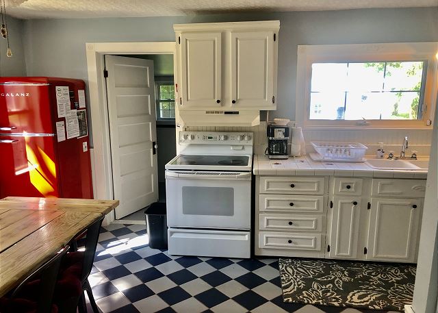 Full kitchen with dining area