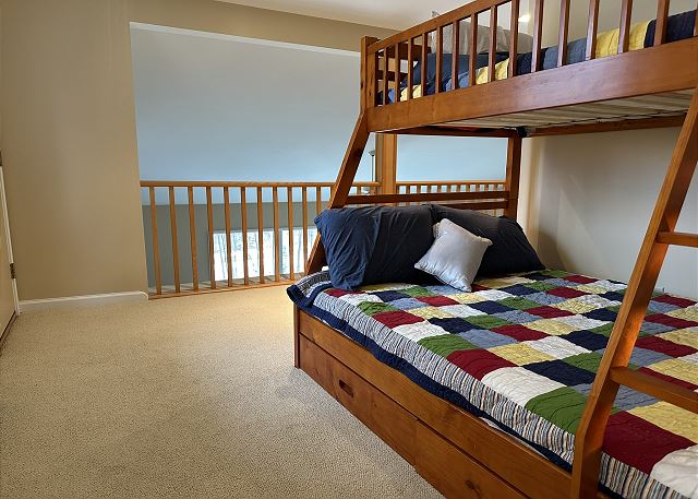 Loft area with bunk beds. 