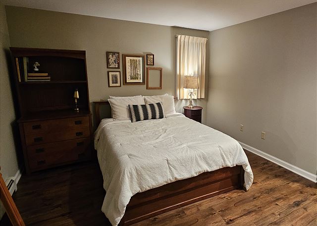 Ground floor bedroom with queen bed