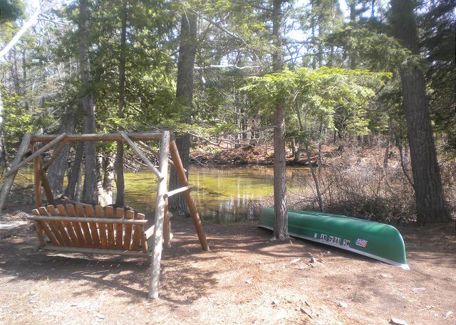 Enjoy provided canoe and swing on the river