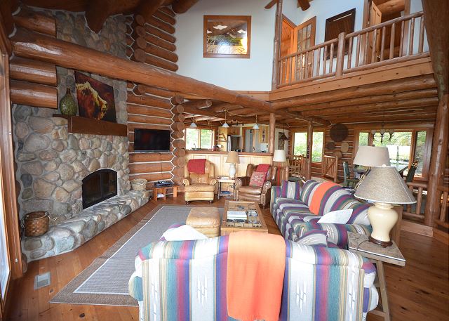 Cozy up around the stone fireplace