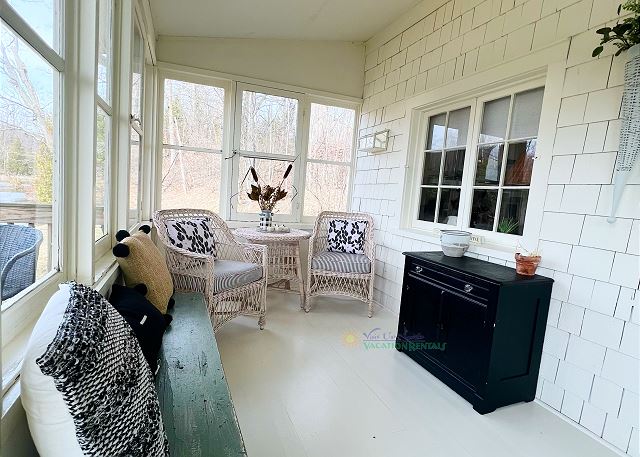 Enclosed outdoor patio.