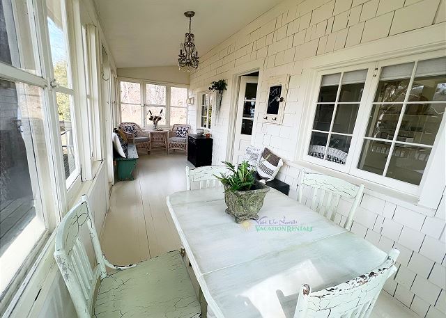 Seating on enclosed patio. 
