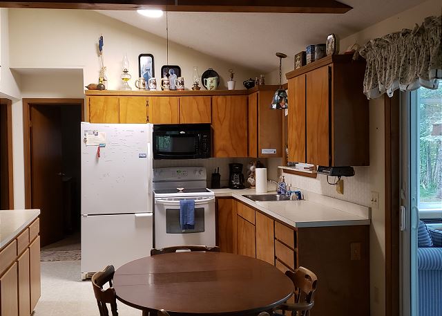 Fully equipped, cooking basics, dishware & flatware, oven, stove, microwave, toaster, drip coffee maker, dishwasher, trash bags, paper towels.