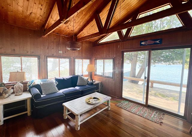 Sitting/family area sliding doors to deck. Views of Lake Leelanau. 