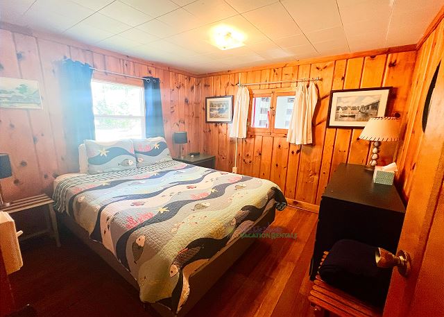 Bedroom with queen bed.