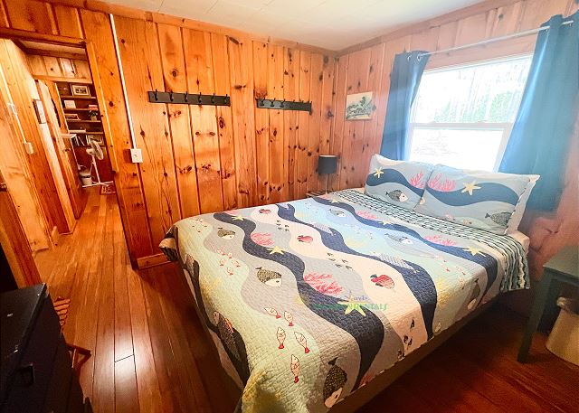 Bedroom with king bed. 
