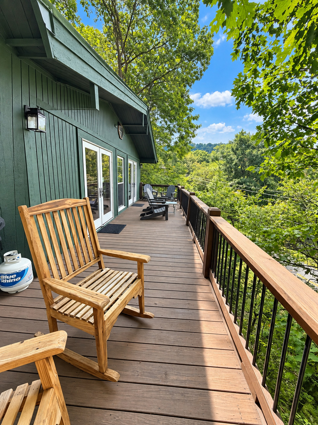 Tree Top Cabin - outdoor firepit, deck, wood burning fireplace | Photo 14