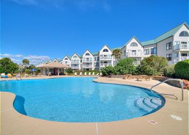 1 of 6 Outdoor Pools and the Building where you are staying