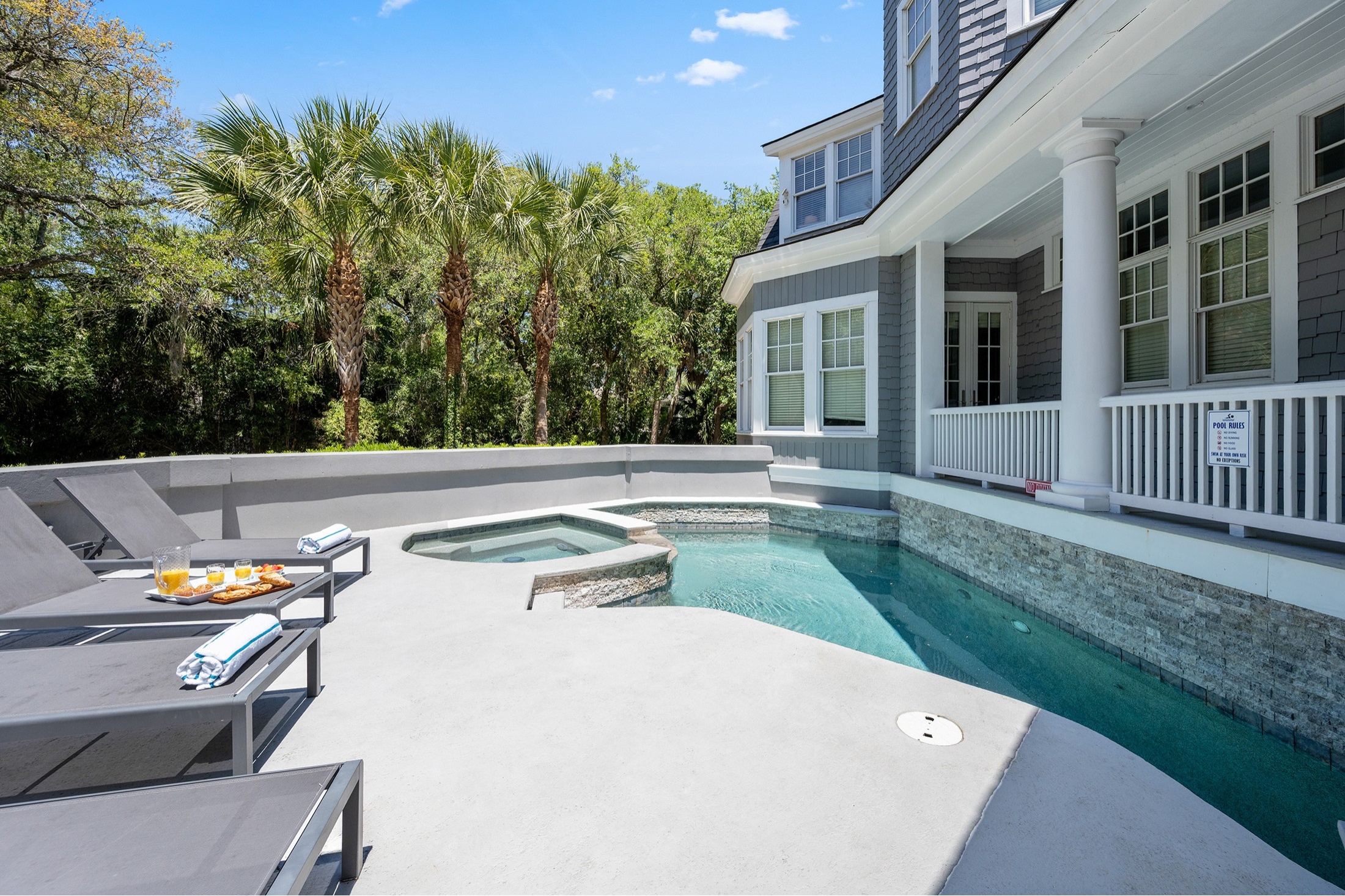 Private pool deck w/ loungers and spa