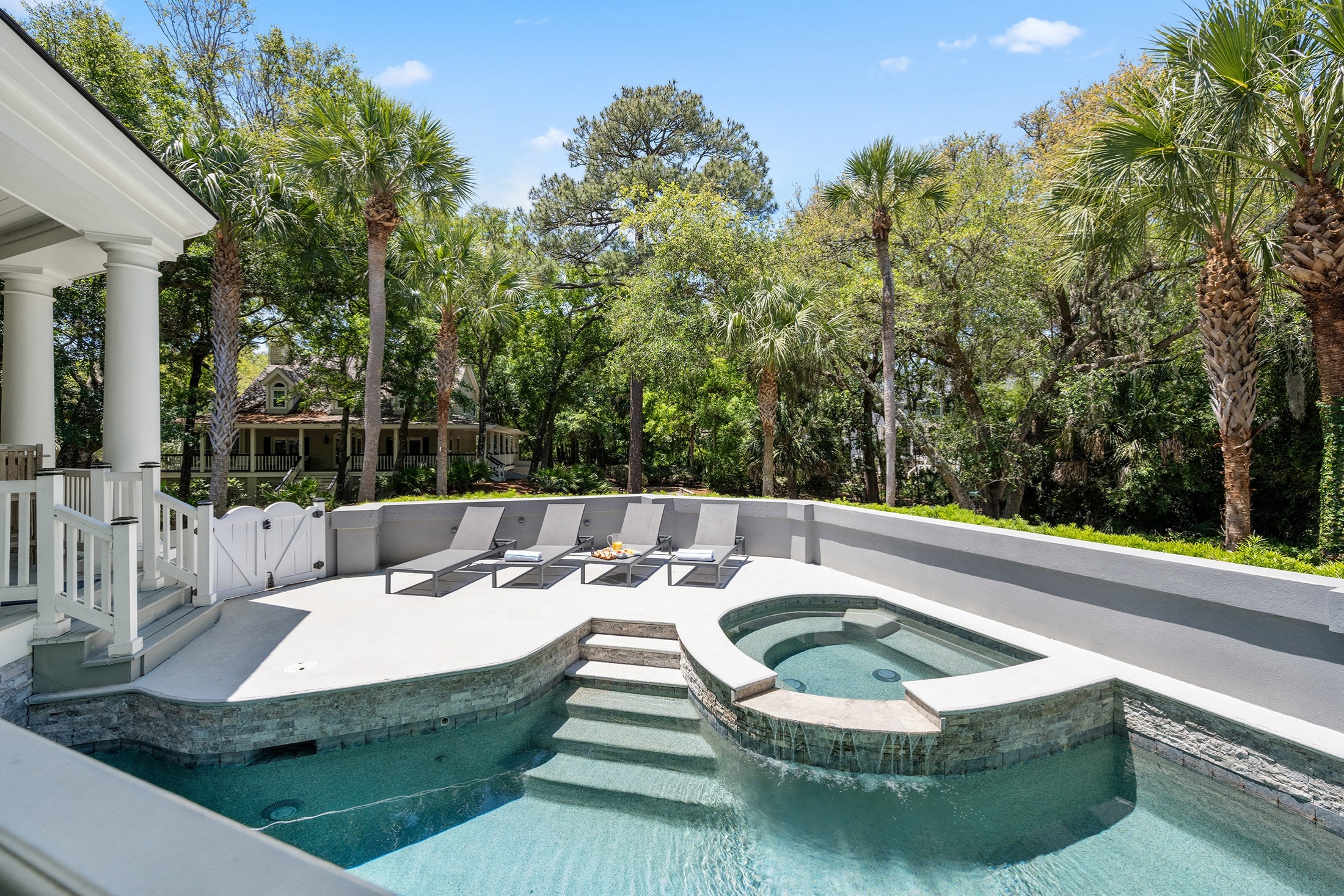 Private pool deck w/ loungers and spa