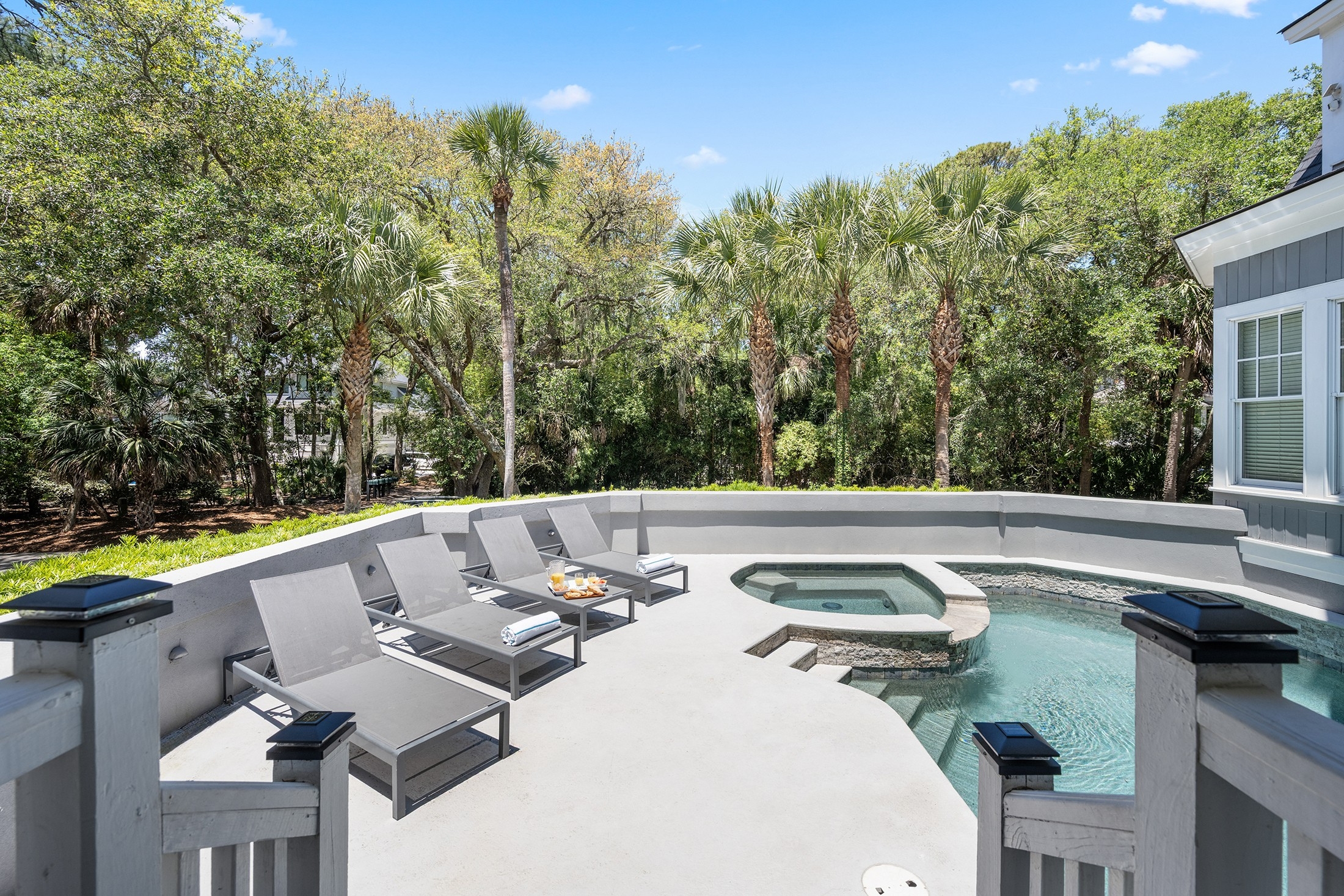 Private pool deck w/ loungers and spa