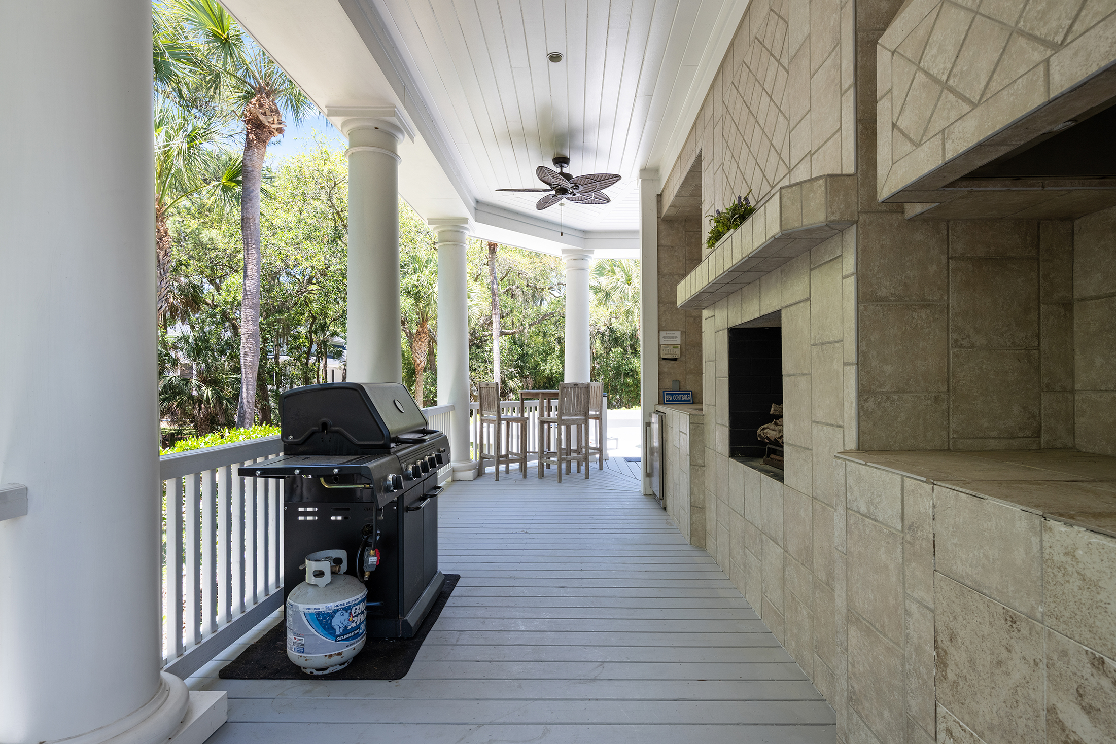 3 Iron Clad | Wrap around porch w/ seating, grill, & fireplace