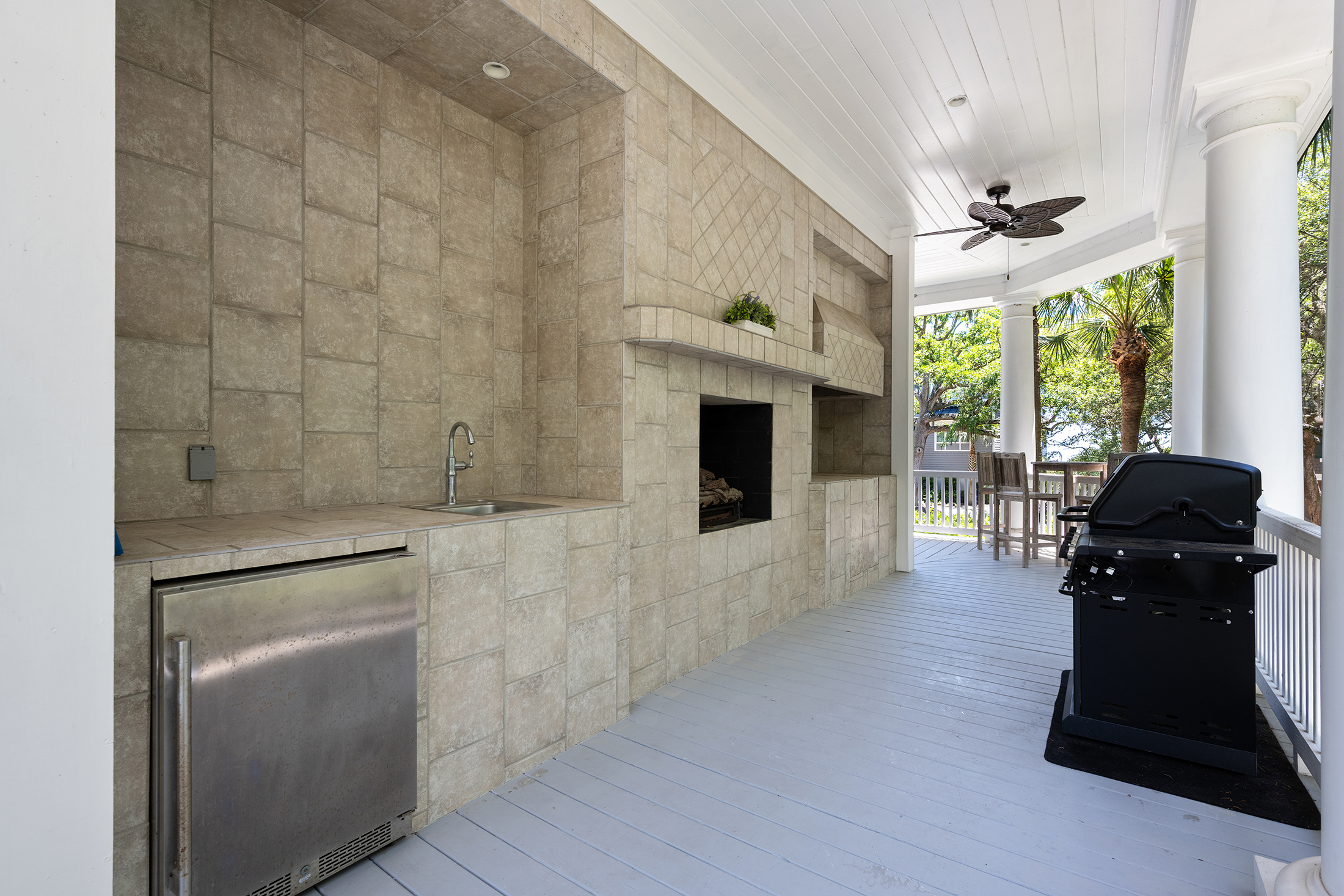 3 Iron Clad | Wrap around porch w/ seating, grill, & fireplace