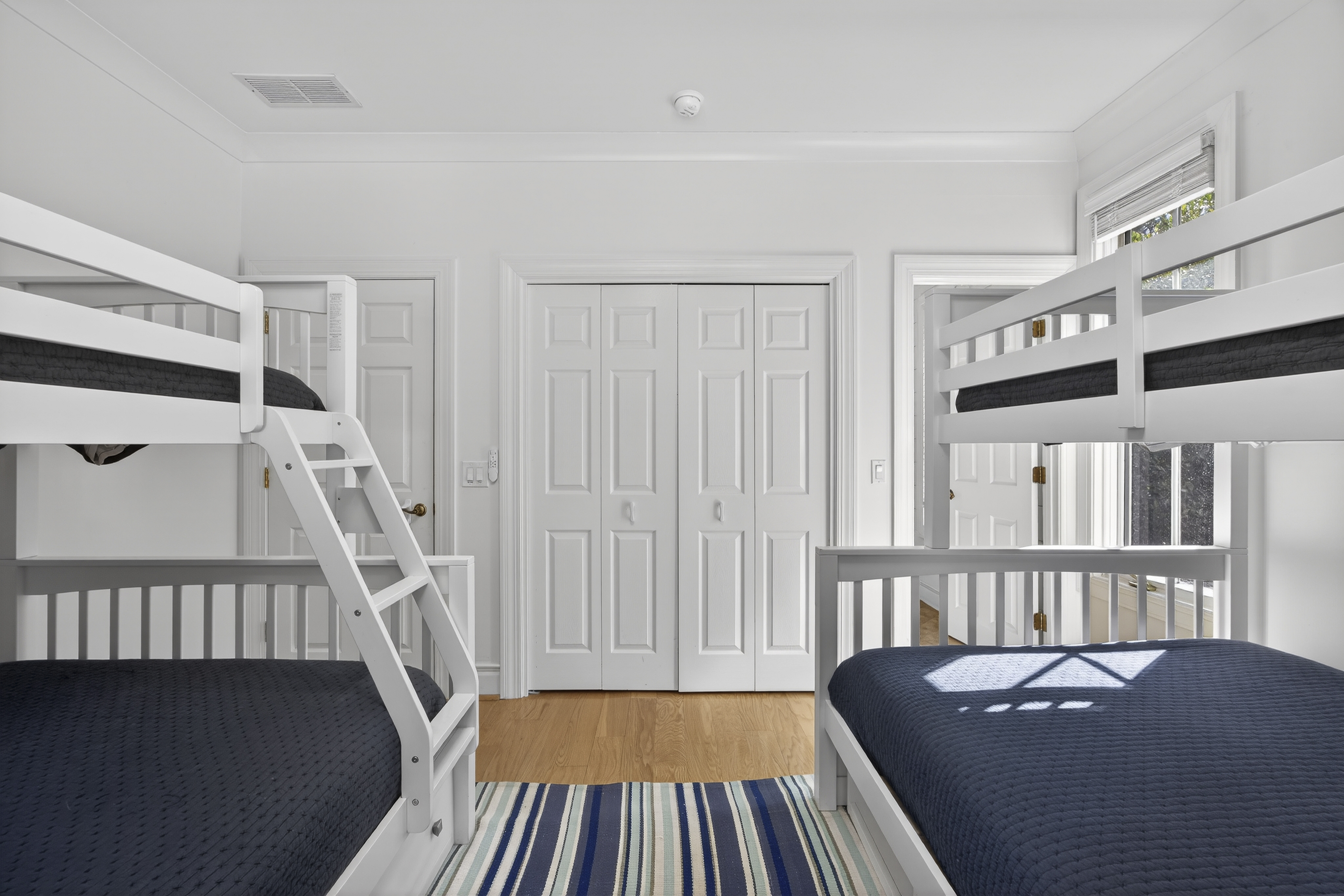 Bedroom 3 w/ 2 twin over full bunk beds & ensuite bathroom