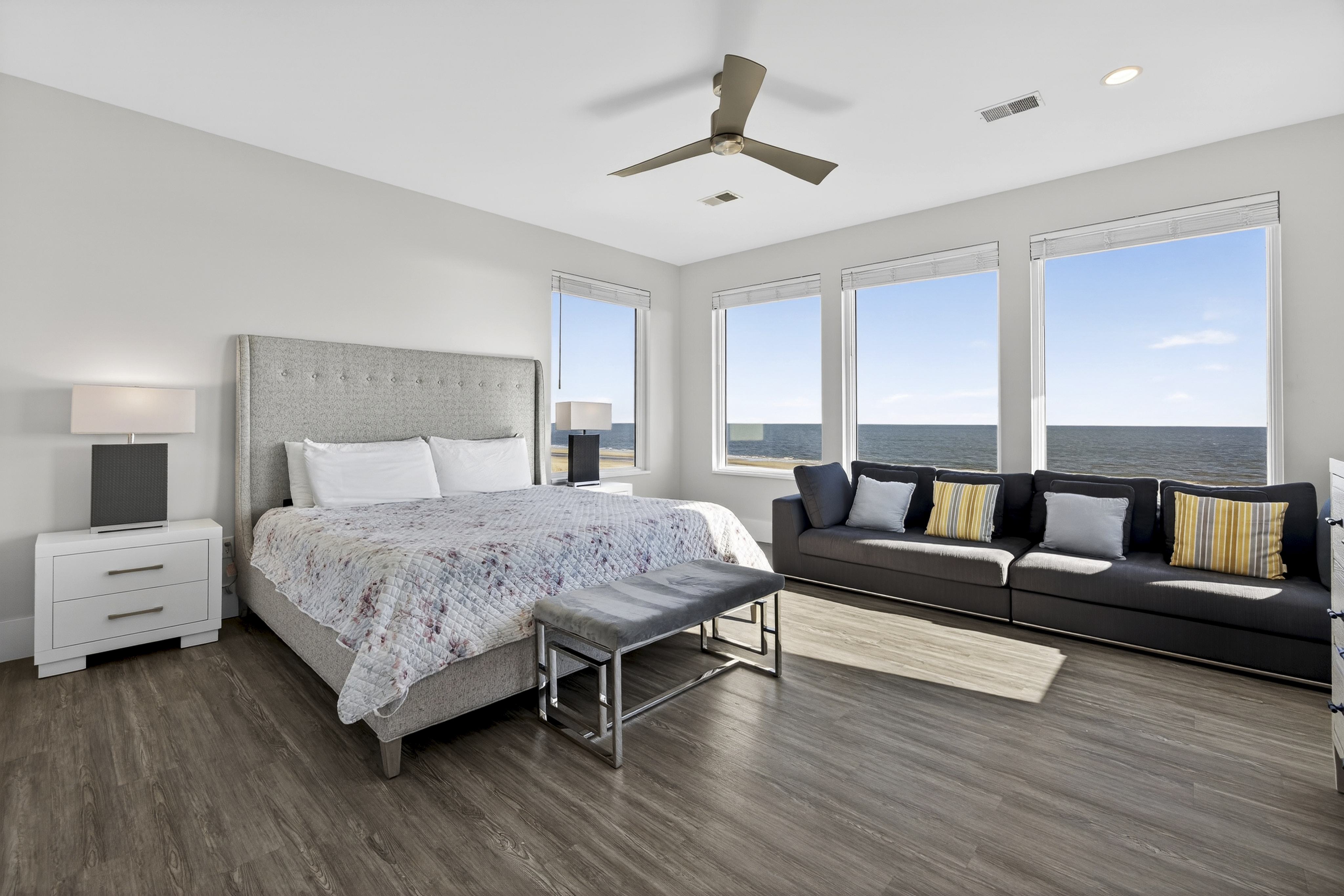 103 Dune Lane | Bedroom 5 w/ King bed, sofa, & ocean views