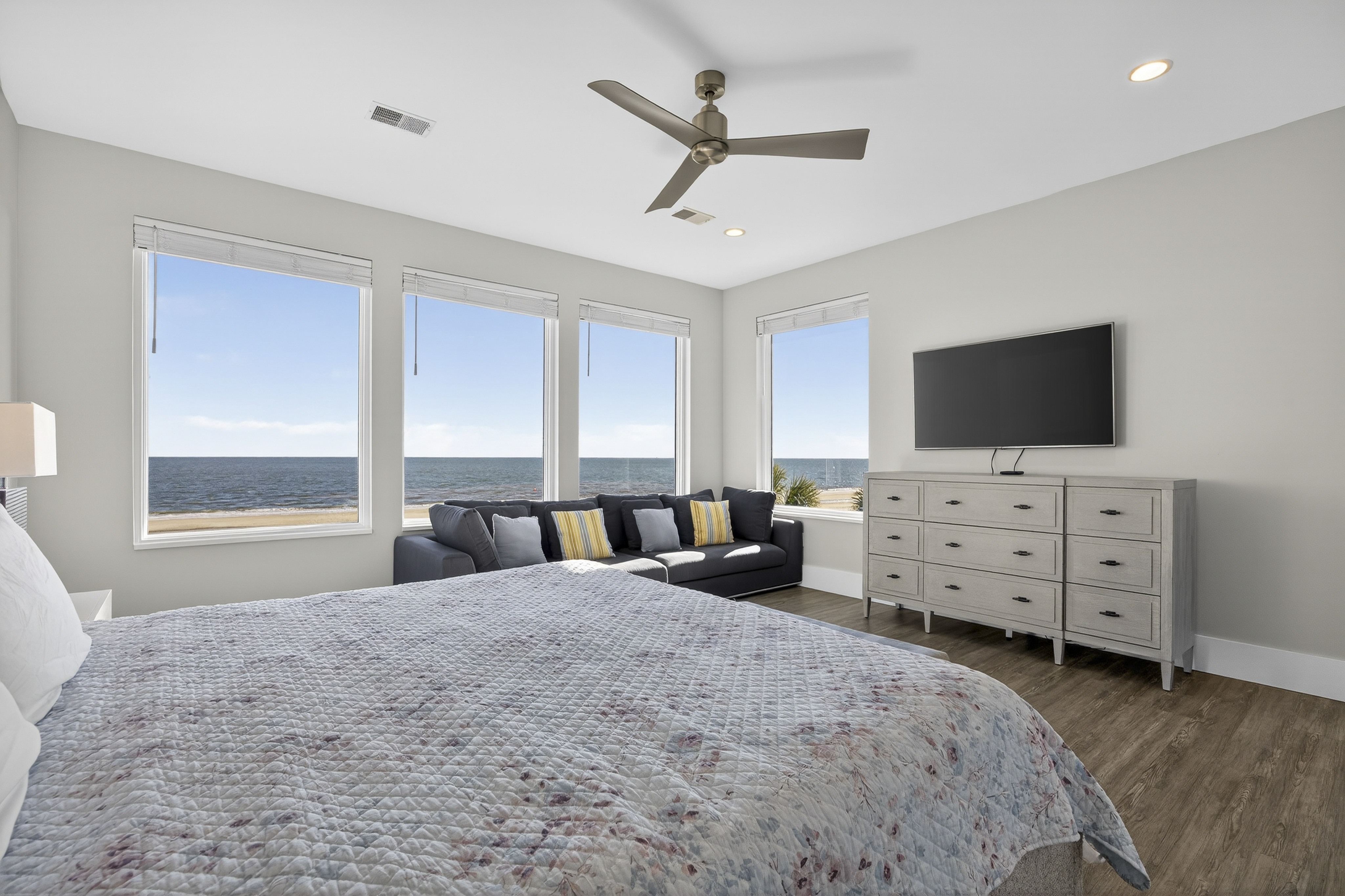 103 Dune Lane | Bedroom 5 w/ King bed, sofa, & ocean views