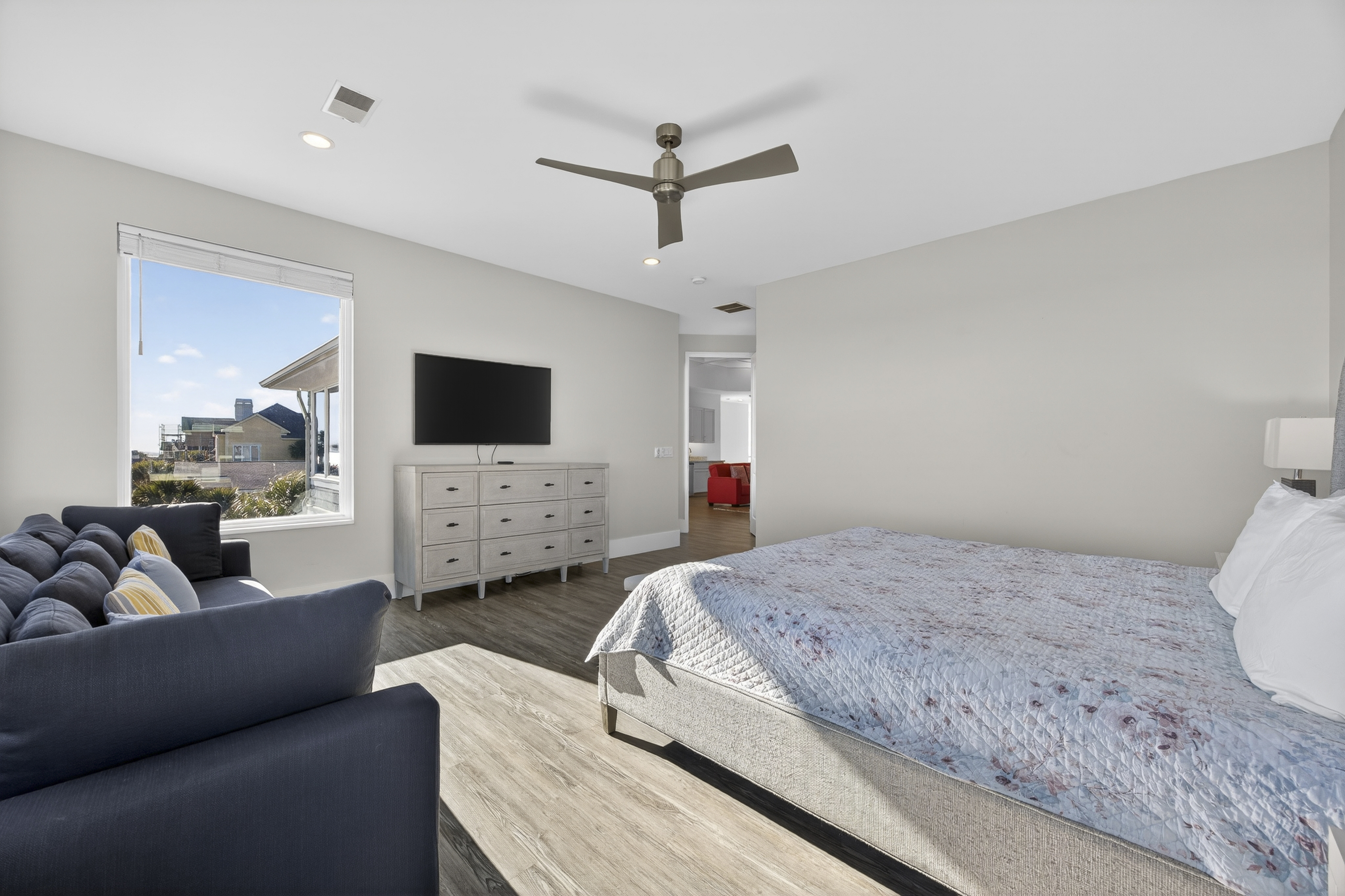 103 Dune Lane | Bedroom 5 w/ King bed, sofa, & ocean views