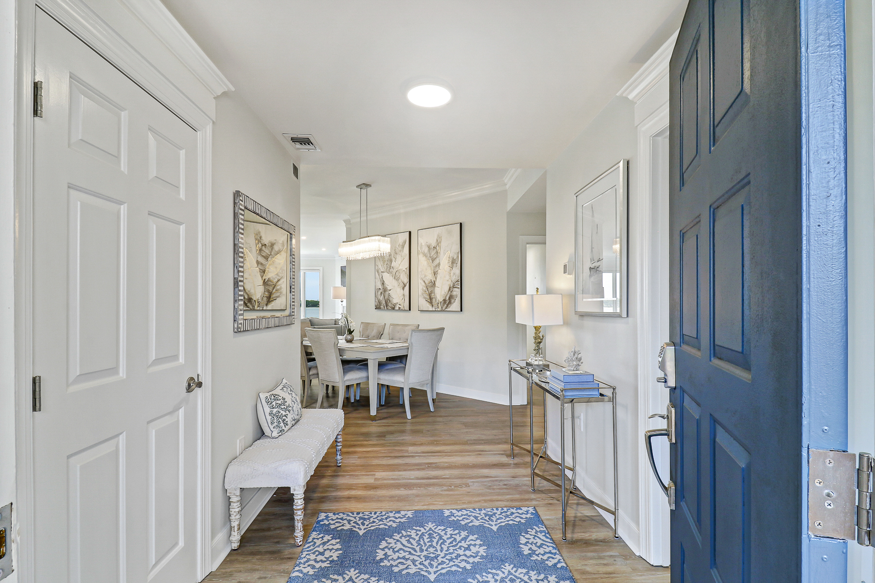 1922 South Beach Club | Bright foyer flowing to dining area