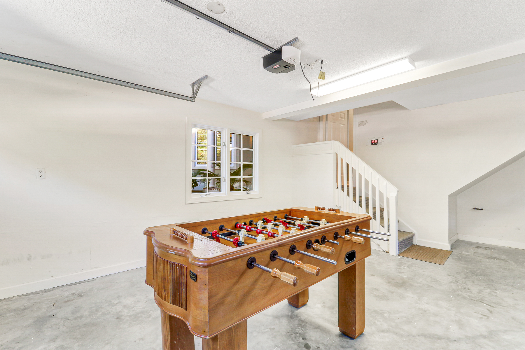 72 Full Sweep | Garage area with Foosball Table