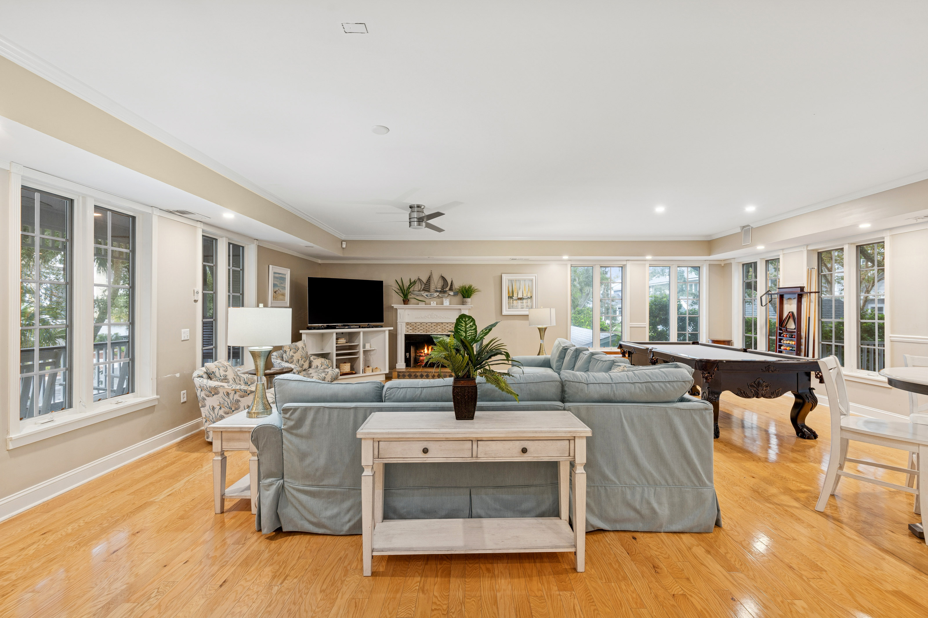 66 Dune Lane | Main Living Room w/ large sofa & Pool Table