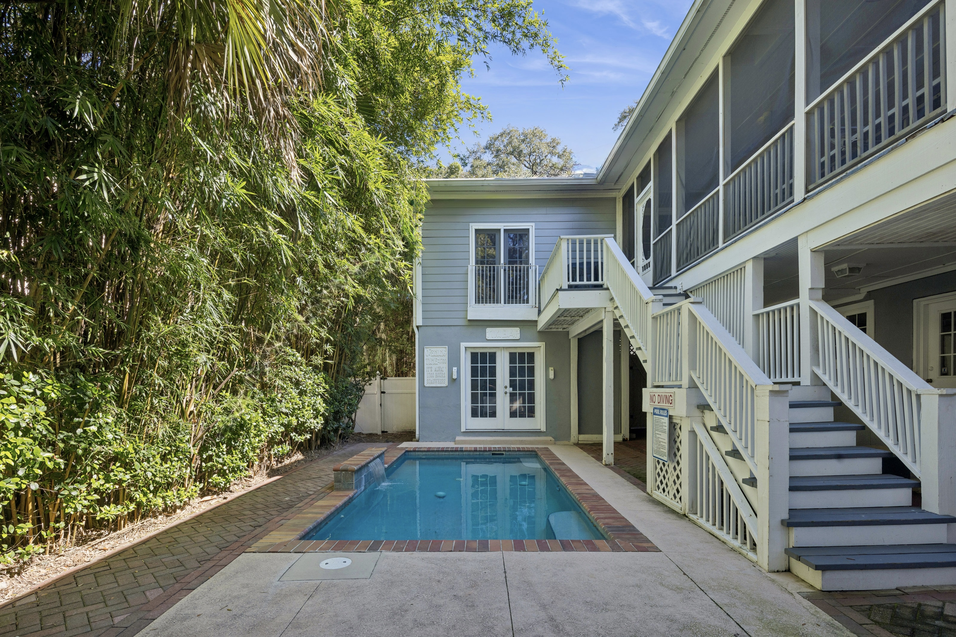 66 Dune Lane | Backyard w/ pool, hot tub, tiki hut & sauna